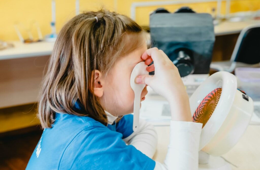 A child is going through vision therapy